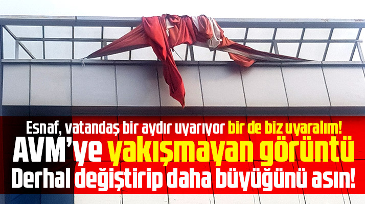 Bafra ilçesinde AVM binasında asılı duran yıpranmış bayrağın değiştirilmesi istendi