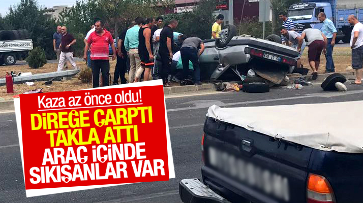 Samsun'un Taflan bölgesinde otomobil aydınlatma direğine çarpıp takla attı