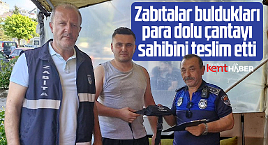 Samsun'da zabıtalar buldukları para dolu çantayı sahibine teslim etti
