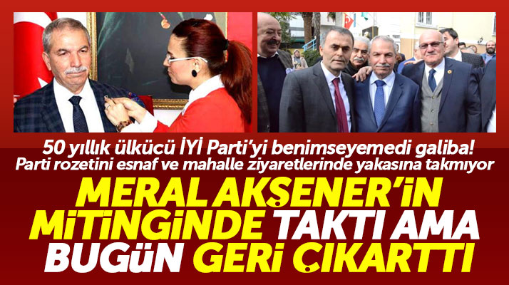 Necattin Demirtaş İYİ Parti rozetini ceketinin yakasına bir takıyor bir çıkartıyor