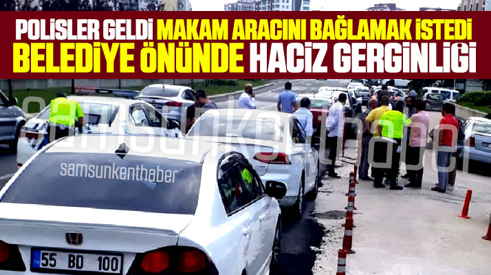 Atakum Belediyesi önünde işte Cemil Deveci'nin makam aracına haciz anları